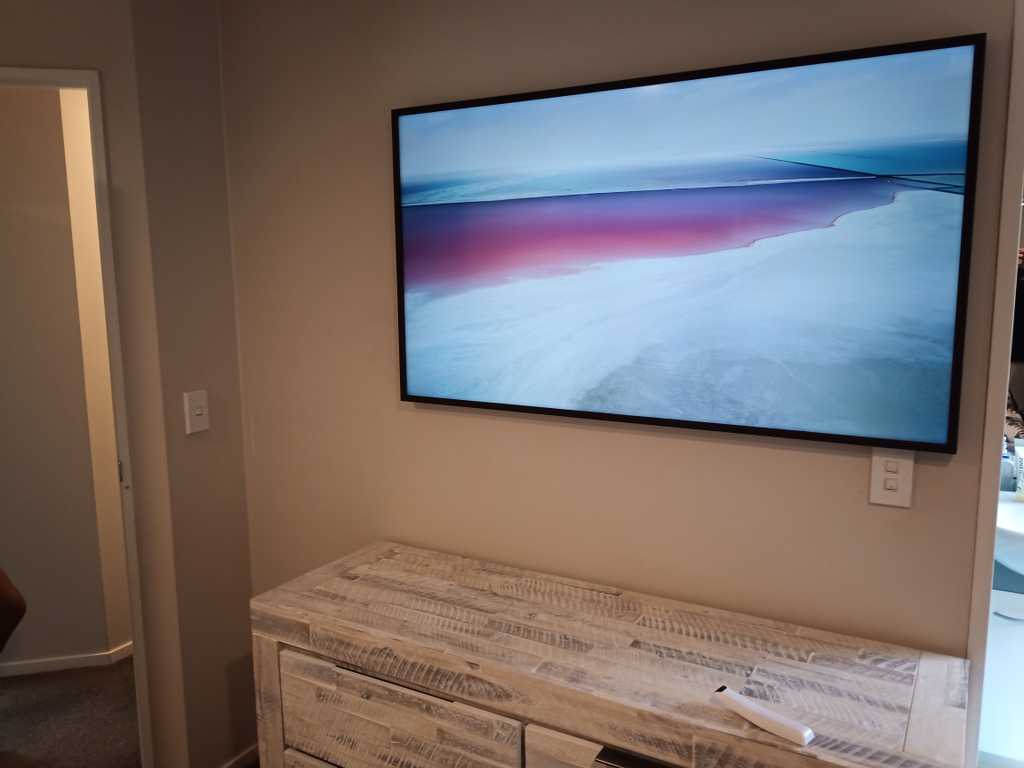 Professional TV wall mount installation services for a sleek and organized living space Professional TV wall mount installation services for a sleek and organized living space